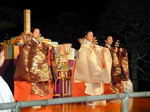 Three maidens with bell clusters purify the area.